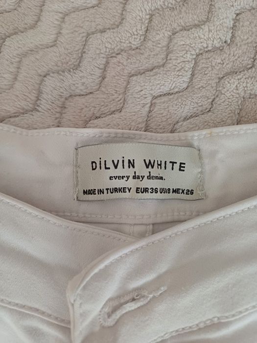 Штани білі кльош