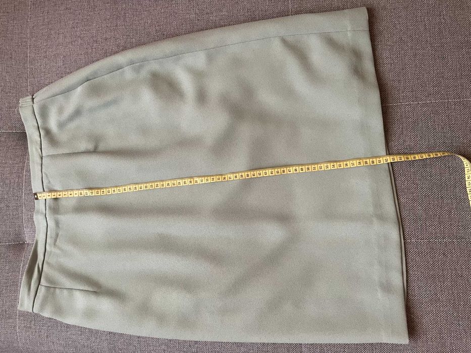 Zielonkawa garsonka firmy SUITSME