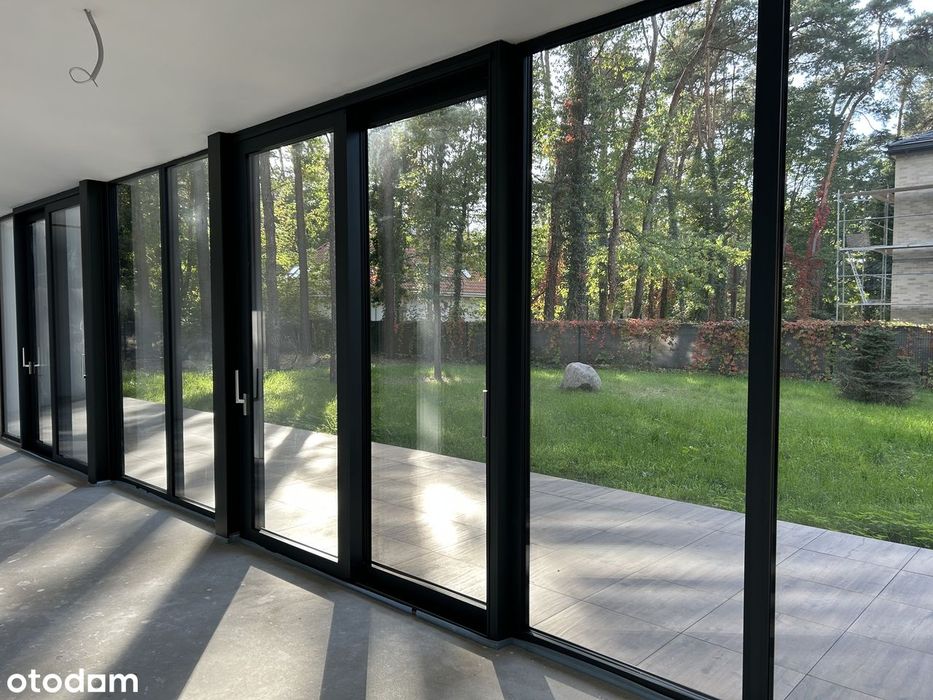 DOM Z PODCIENIAMI autorski projekt modernistycznego domu w Magdalence