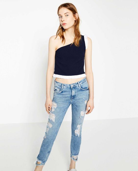 Nowe jeansy Zara z dziurami