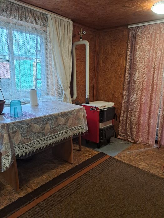 Продам 1/2 будинку