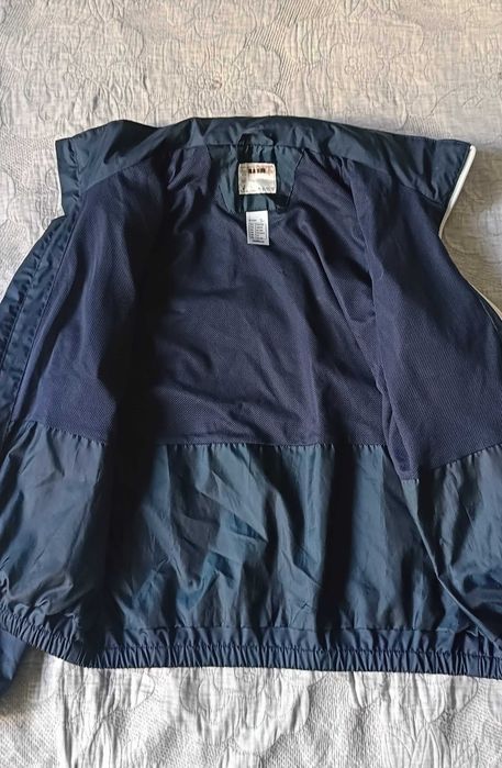 Kurtka przeciwdeszczowa  
rozm 143-152 Quechua Decathlon