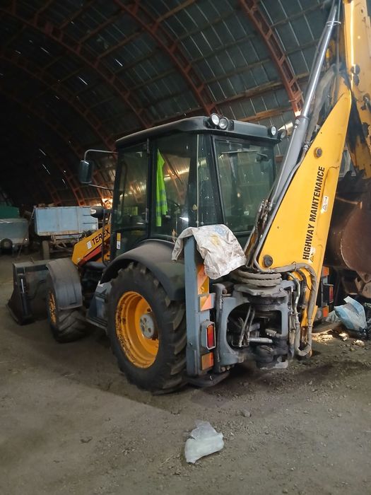 Экскаватор погрузчик  TEREX 860
