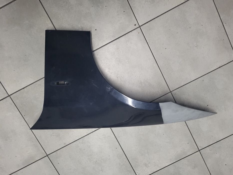 Blotnik lewy przod BMW E90 naprawiony