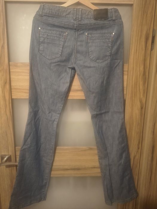 Damskie długie spodnie jeansowe (Reserved W30 L34)