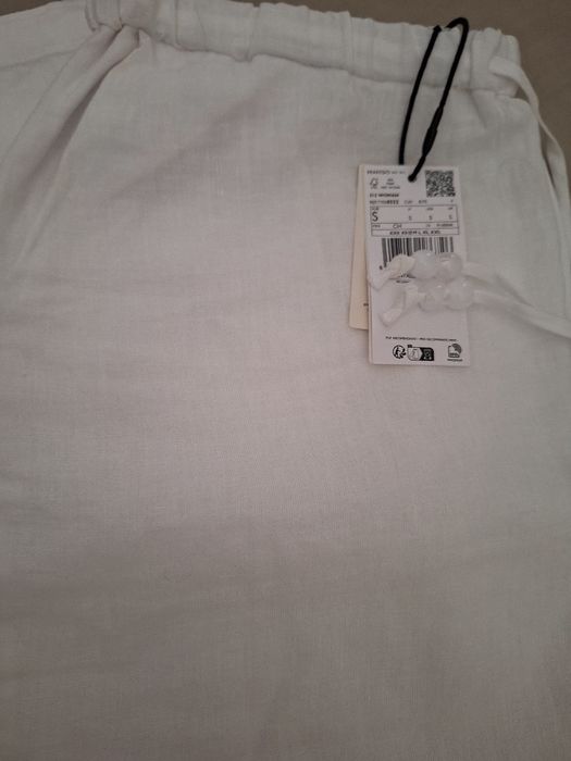 Calças em linho brancas Mango