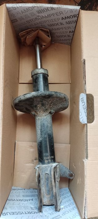 Задний амортизатор Мазда 626(2002г.)