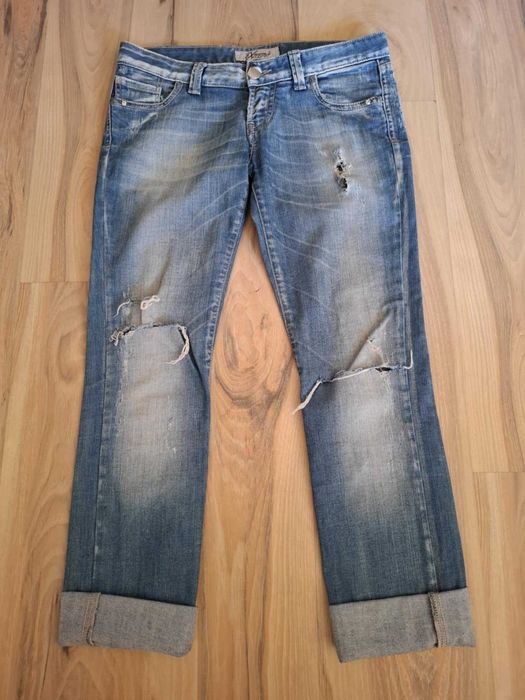 M niebieskie spodnie jeansowe przecierane z rozdarciami z dziurami