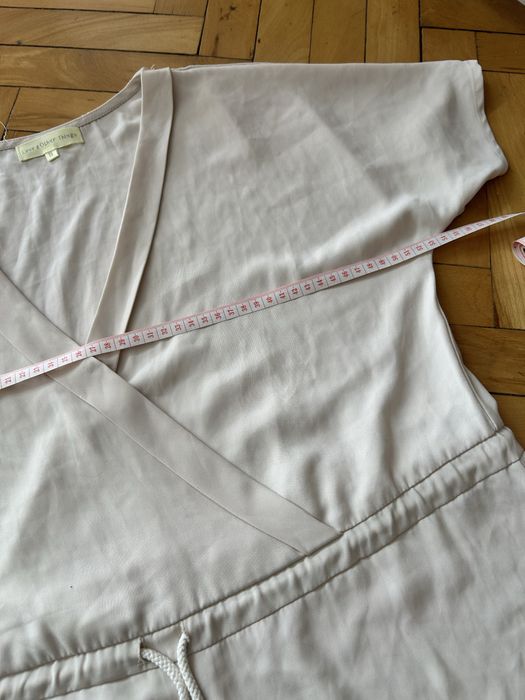 Damski kremowy kombinezon