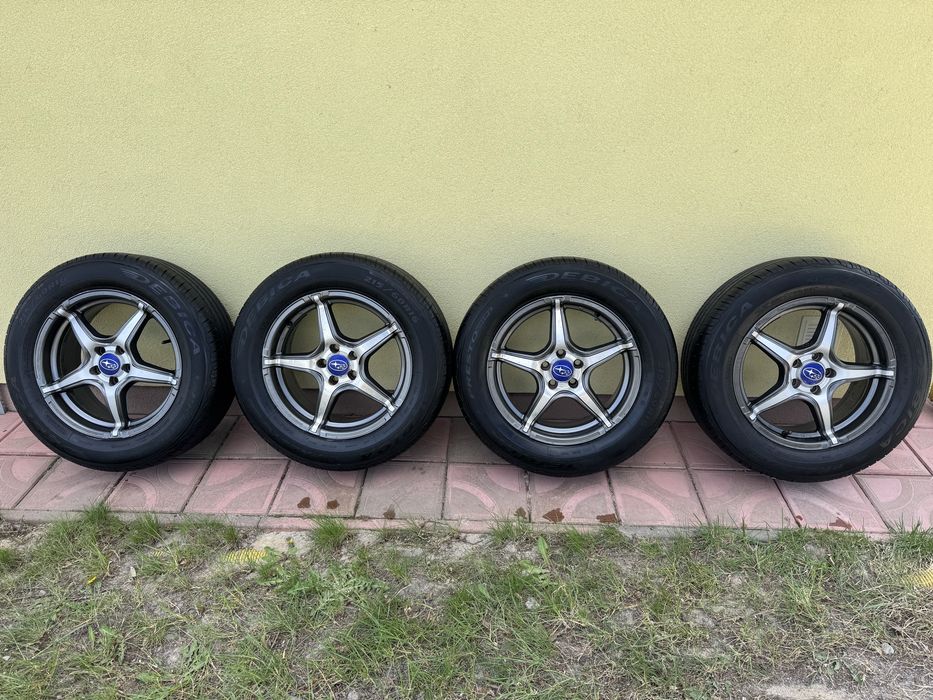 Felgi 16 5x100 Opony letnie 215/60r16 bieznik 7mm Subaru Fotester Legacy