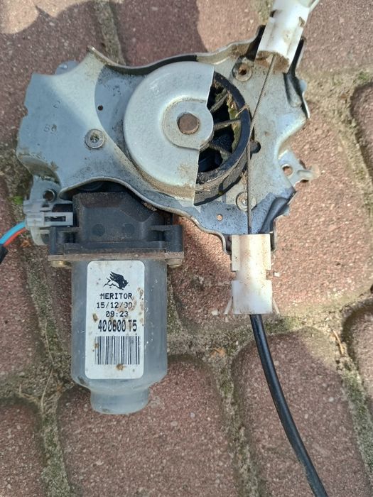 Podnośnik szyby elektryczny przedni prawy nissan primera P11