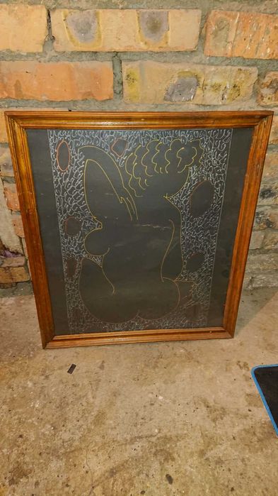 Grafika w drewnianej ramie za szkłem