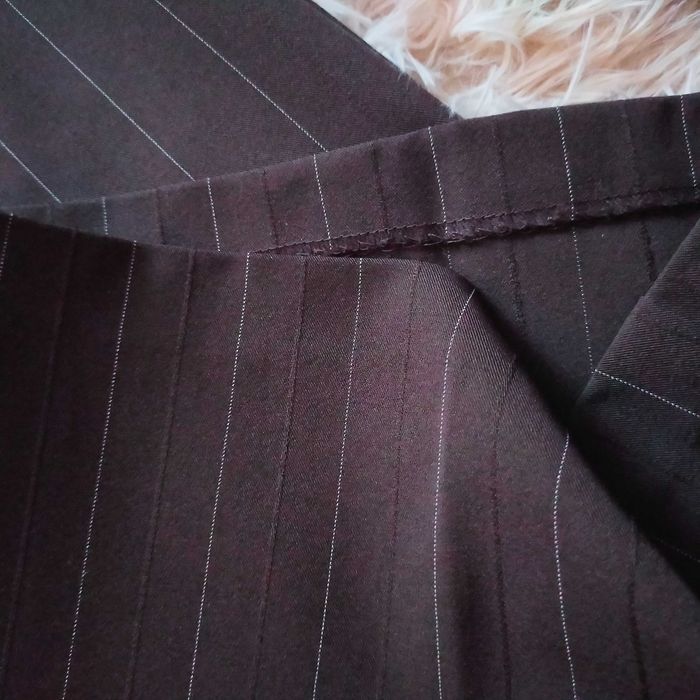 Eleganckie brązowe spodnie w idealnym stanie