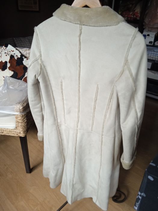 Belo casaco em pele de carneiro