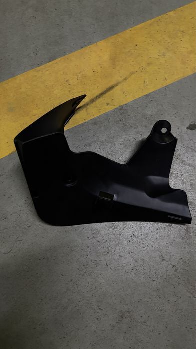 Брызговик задний левый Тесла 3 от 2016 до 2021 года