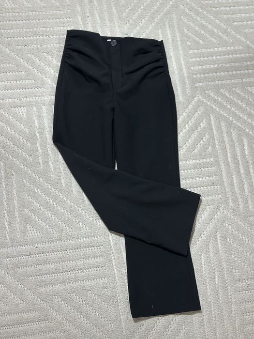 Штани кльоші Zara