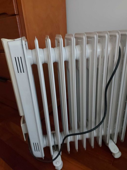 Aquecedor eléctrico como novo