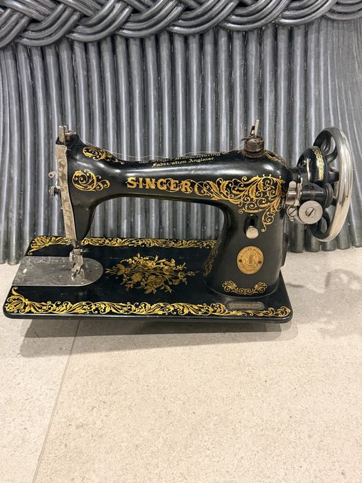 Maquina de costura singer antiga