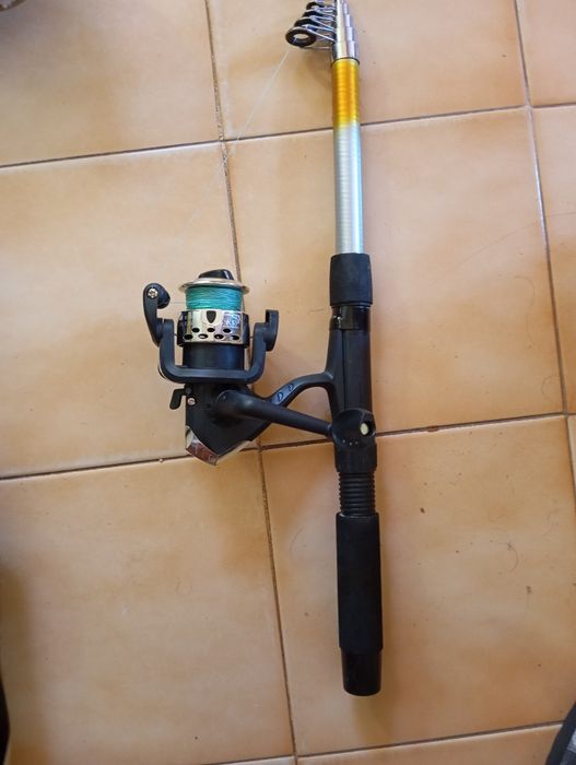 2 Canas de pesca  c/ carrete usadas