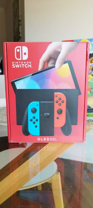 Nintendo Switch Oled + Ring Fit Adventure