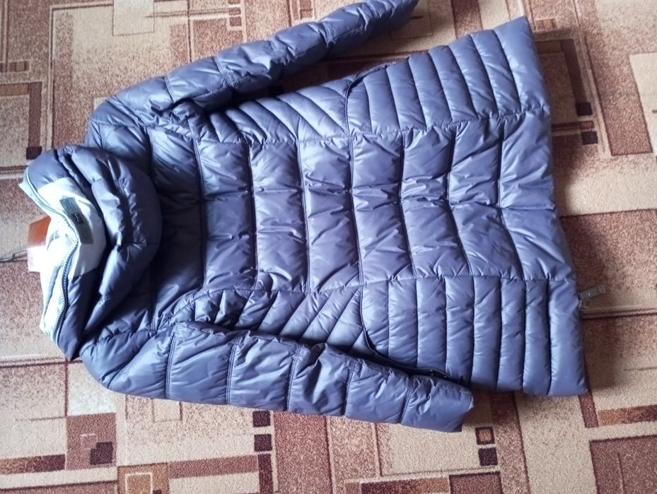 Продам пуховик .
