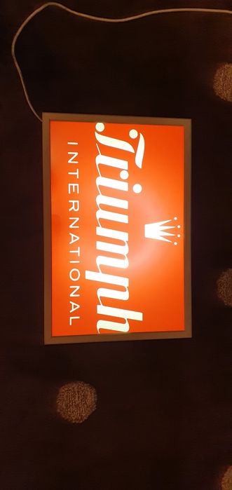 Vintage Triumph Lingerie Neon Sign