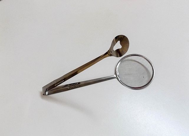 Escumadeira em inox para a cozinha – Nova