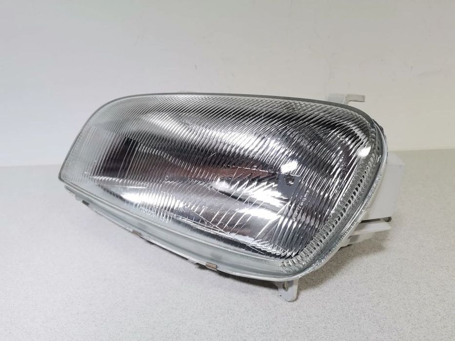 lampa reflektor lewy  toyota rav4 rav 4 i 94-97 oryginał