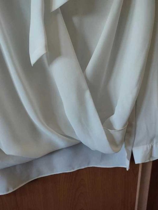 Blusa efeito cruzado com laço S
Nunca cheguei a usar
Shop1One