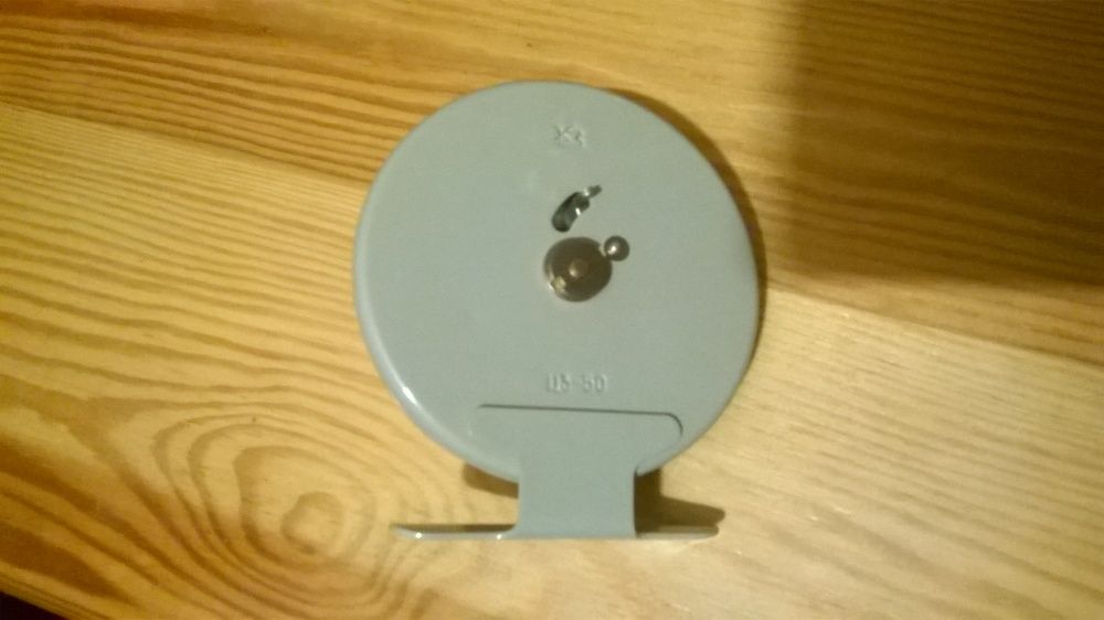 Kołowrotek wędkarski z grzechotką, średnica 8cm- NOWY!!