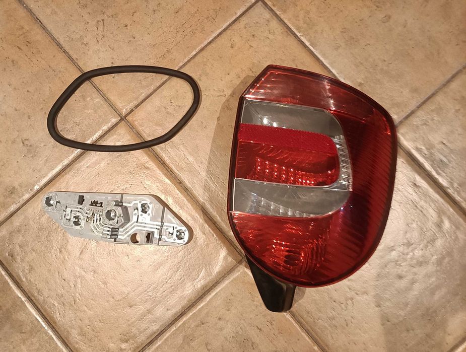 Farol esquerdo traseiro do Renault grande modus