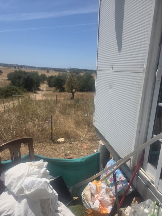 Terreno com casa modelar