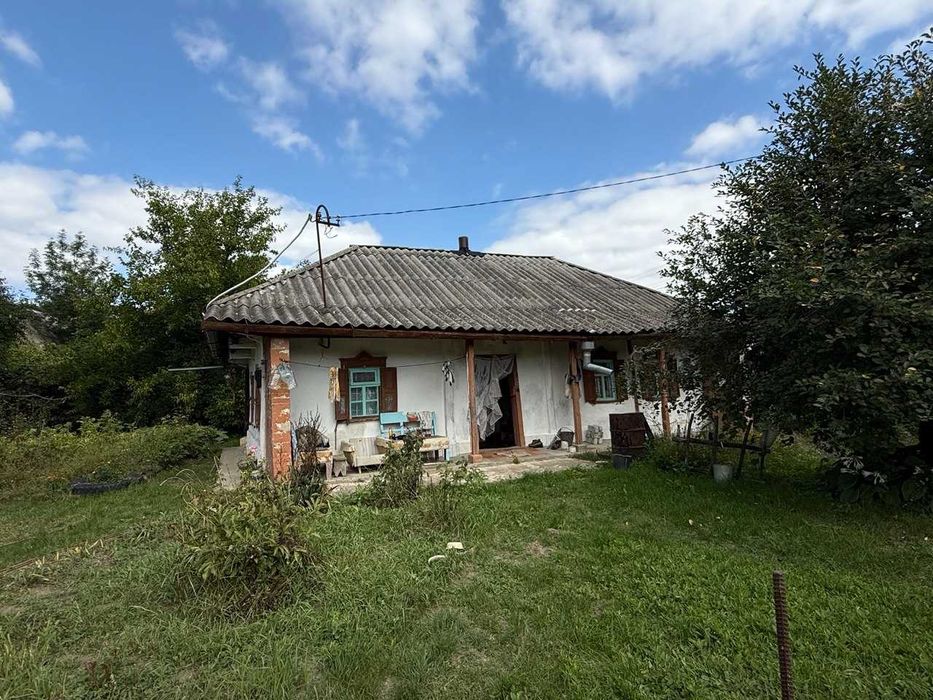 Одноповерховий будинок. 20км до центру міста. Ділянка 21 сотка. Житловий стан.