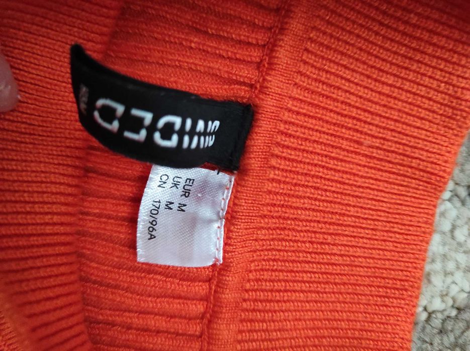 Koralowa prążkowana bluzka h&m