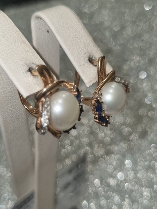 Золото 585 діаманти та сапфіри перли
