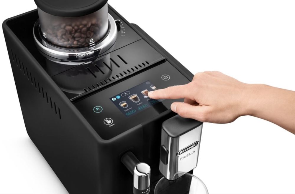 Máquina de café com moedor automático selada e com fatura