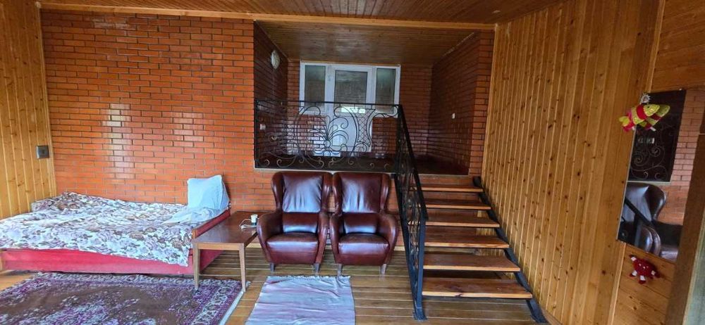 Одноповерховий цегляний будинок 117.3 м², 22 сот, басейн, 2 гаражі