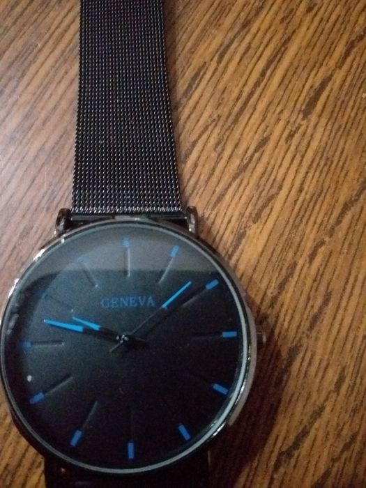 Чоловічий годинник.