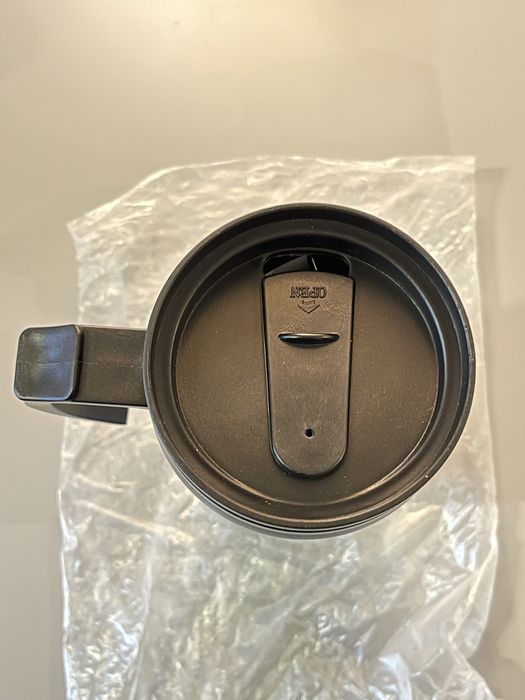 Kubek termiczny z napisem. Nieużywany