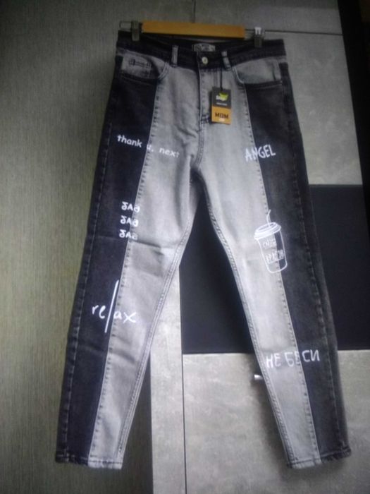 Нові трендові джинси мом