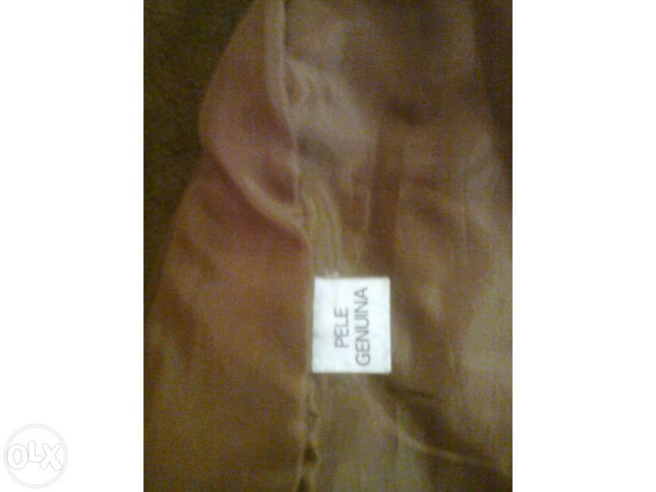 Casaco em pele genuina