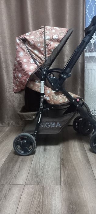 Дитяча прогулочна каляска