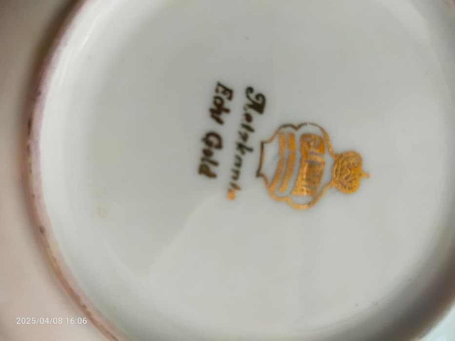 Чашка кофейна з тарілочкою