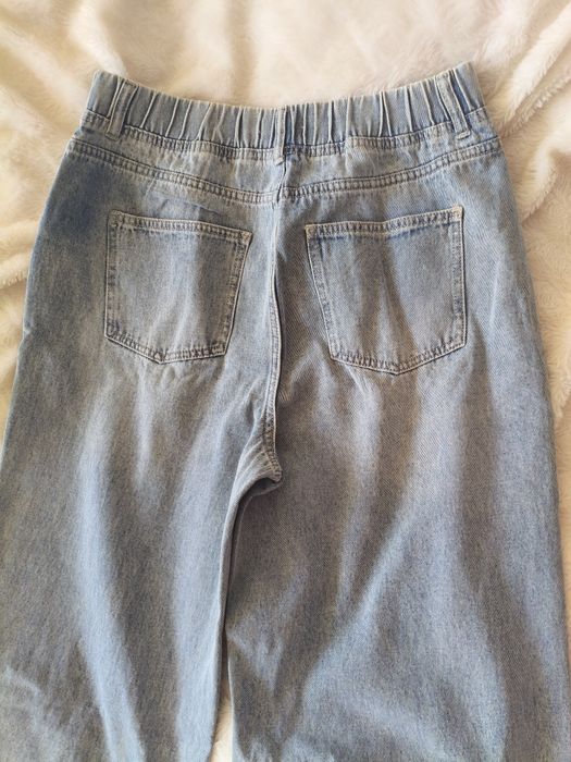 Spodnie jeansy nowe bez metki Sinsay M/L.
