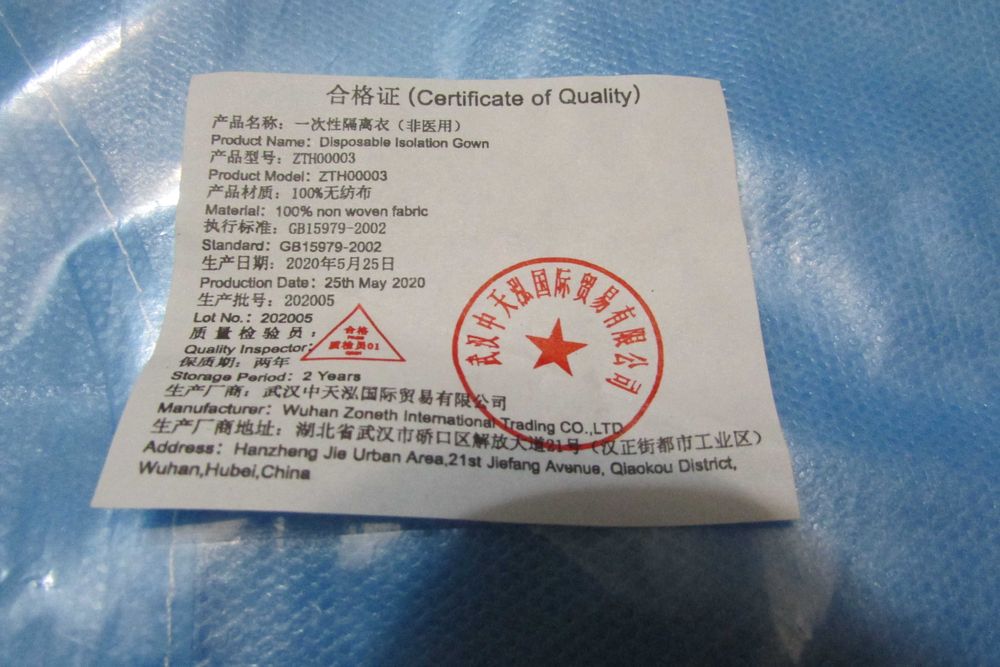 Одноразовий халат  розмір L  10 штук.