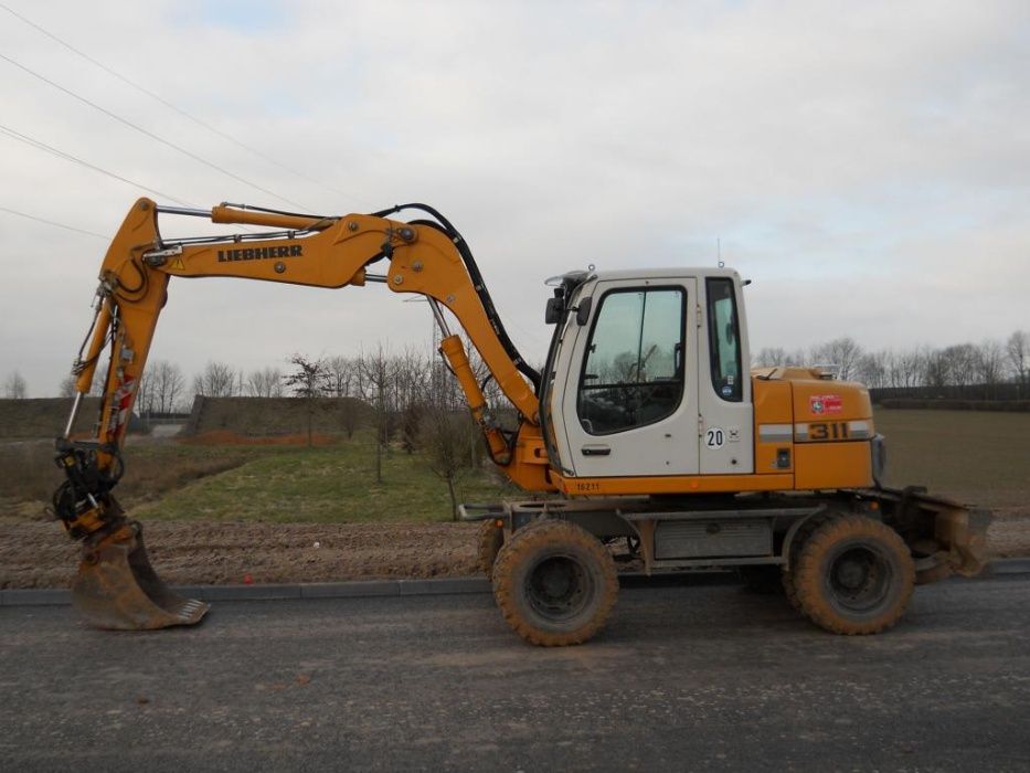 Roboty ziemne Wyburzenia Usługi koparką Ciągnika z przyczepą budowlaną