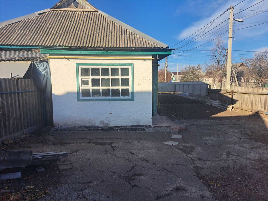 Продам 1/2 будинка