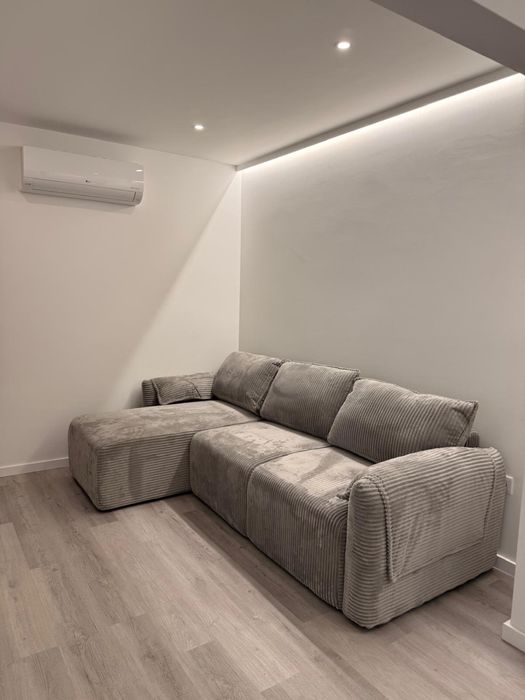 Sofá cama com chaise longue