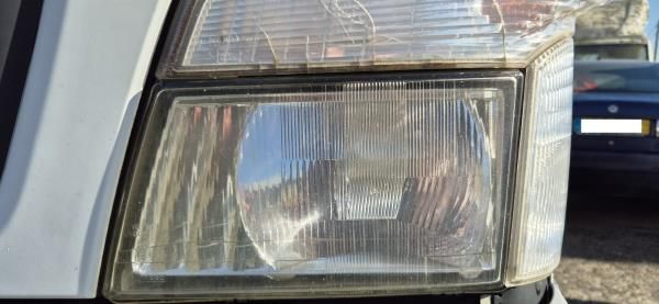Ótica / farol esquerda MITSUBISHI Canter (FB7, FB8, FE7, FE8) VII