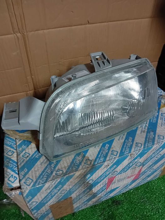 farol esq fiat punto mk1 novo original